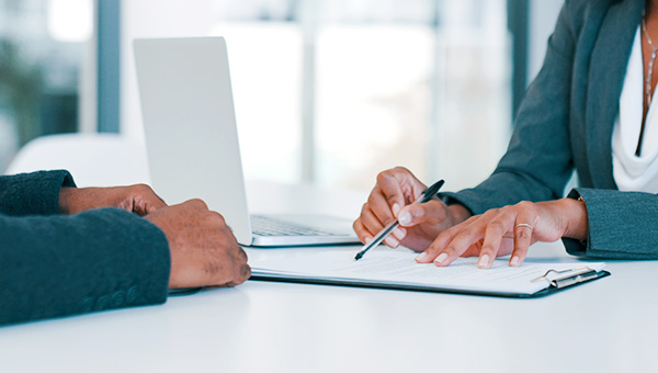 Palms Insurance Terms and Conditions: Business people signing documents